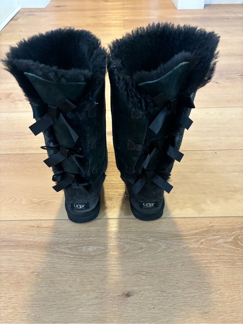 UGG Classic Tall Bow Black Shearling Boots Size 9